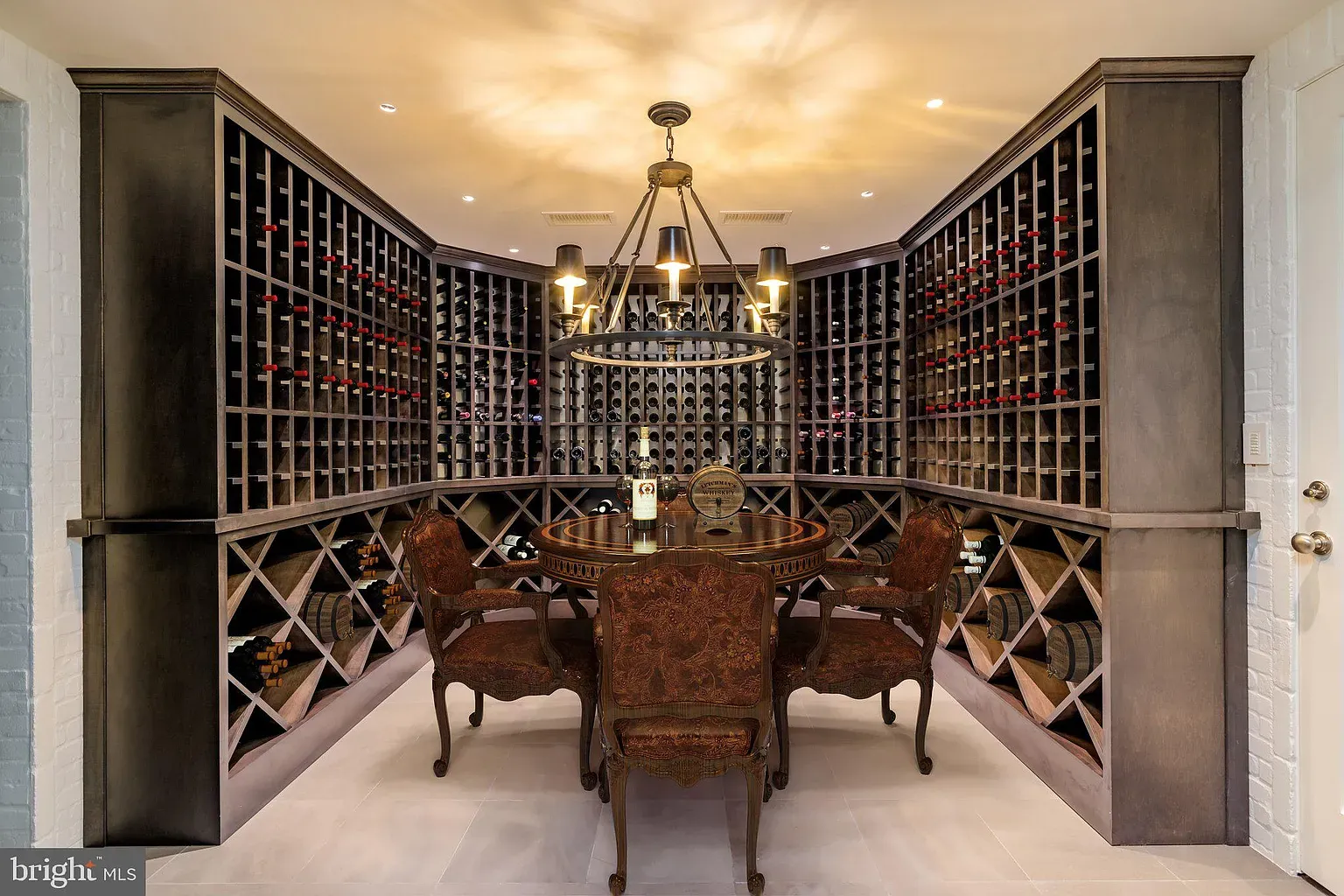 Wine wall goals—dark wood everywhere. Organized to the inch.