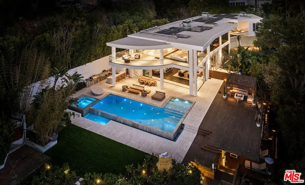 Back patio looks a resort. Clean lines, lots of plants, very calm.