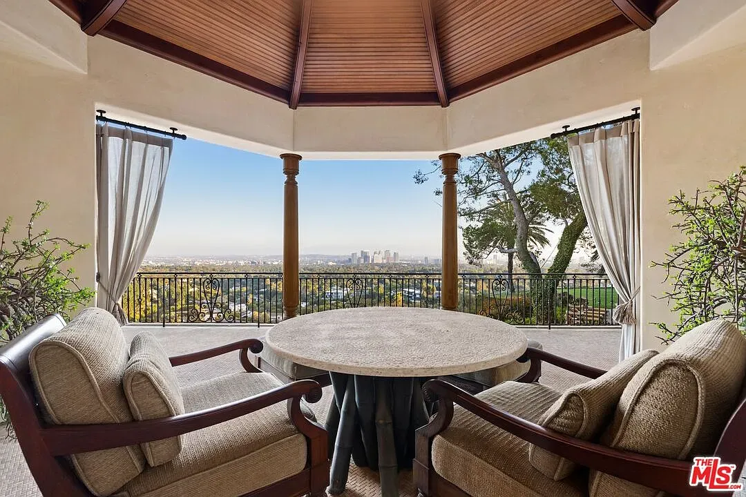 Octagon terrace! Warm wood ceiling, two chairs parked they're guarding secrets.