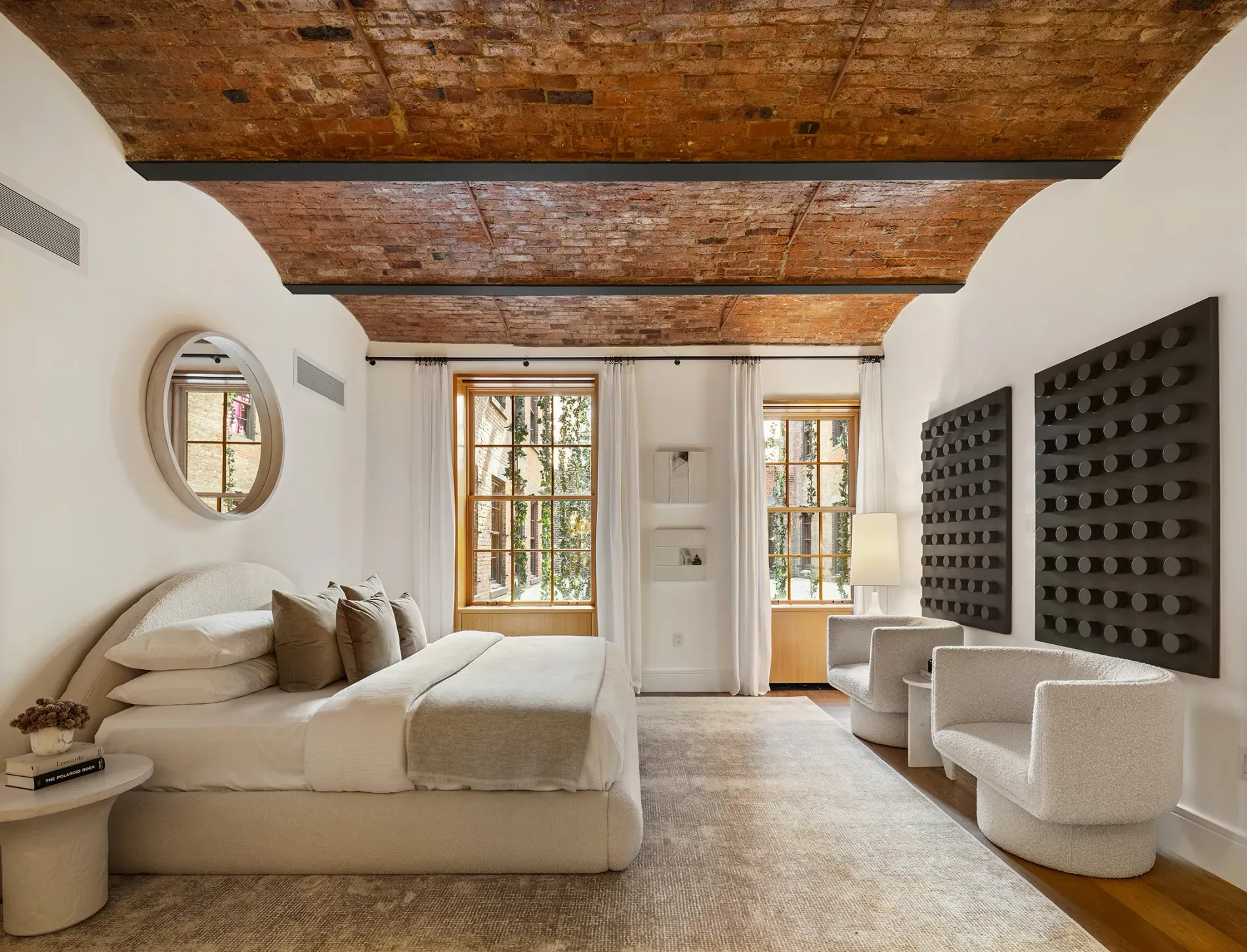 Massive bed with soft neutrals. Comfortable or hotel vibes? I'm into it.