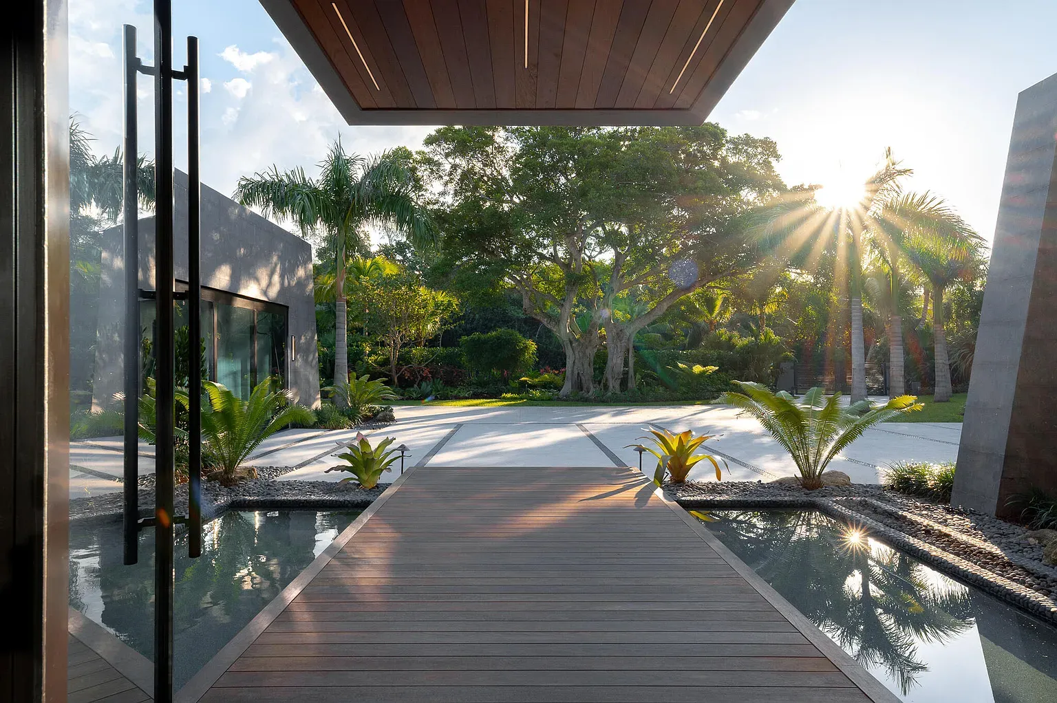 From this angle, the wood plank path feels a boardwalk into the jungle.