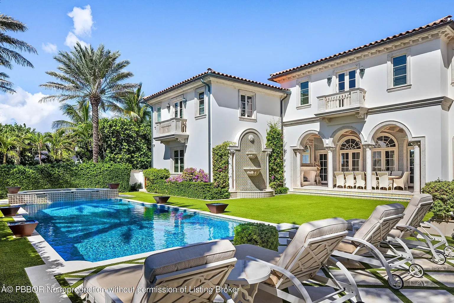 Pool setup. bright blue water, lush edges, cushy loungers. Zero complaints.