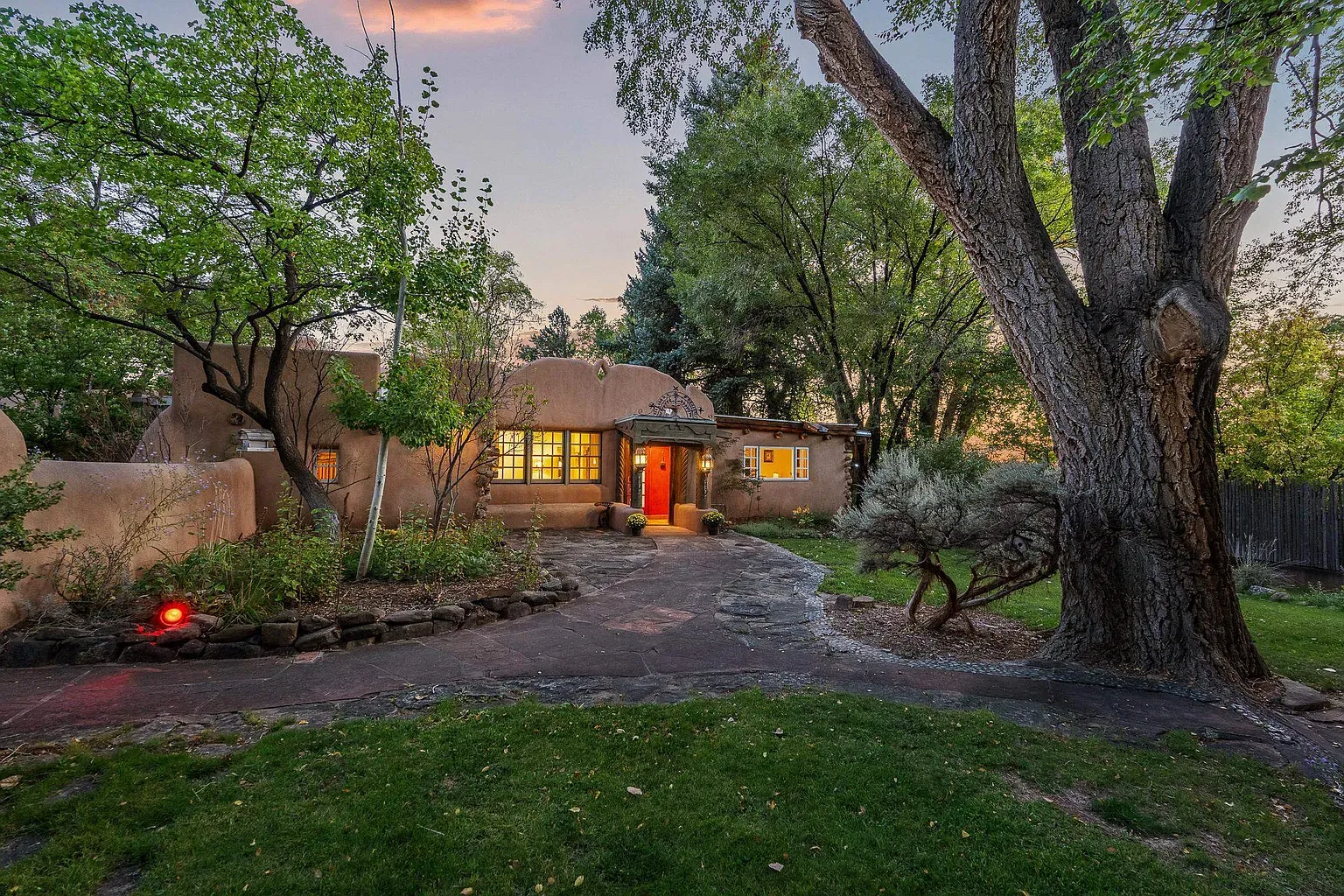 Curvy adobe exterior. Uniquely earthy, it grew here.
