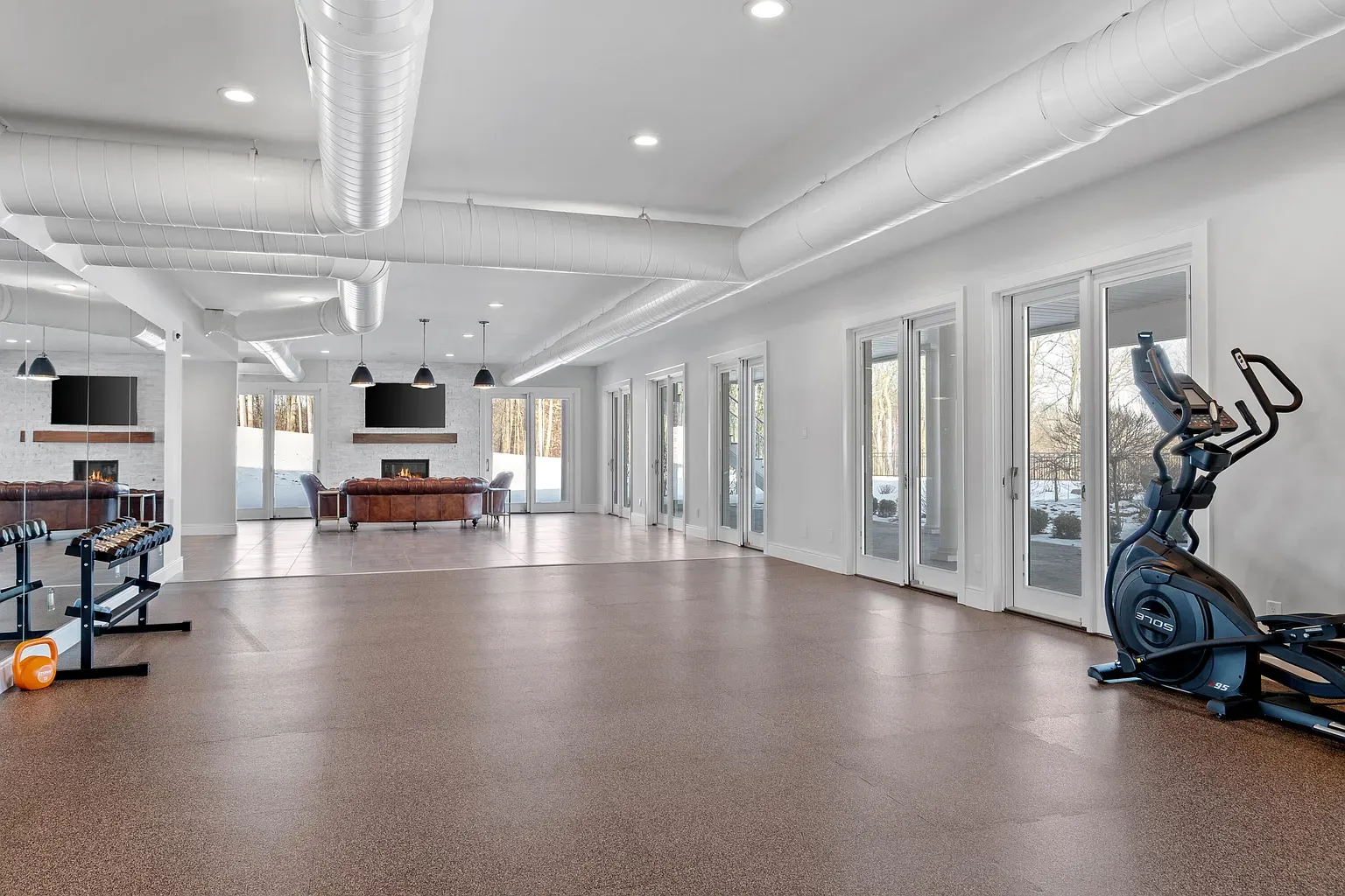 Big home gym with cork floors. Plenty of room to pretend I stretch.