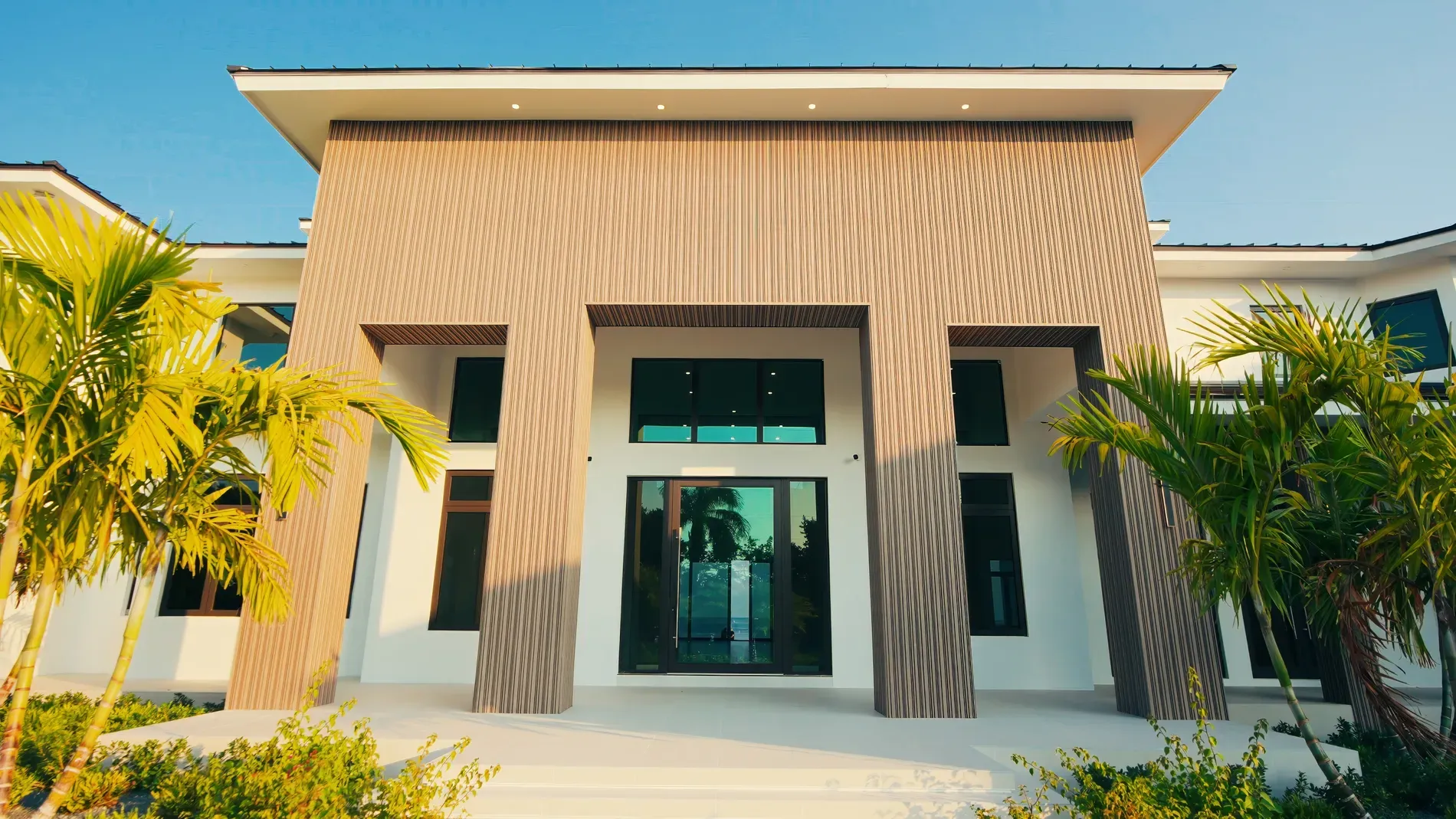 Vertical wood slats with crisp white—warm meets stark. Anyone know that finish?