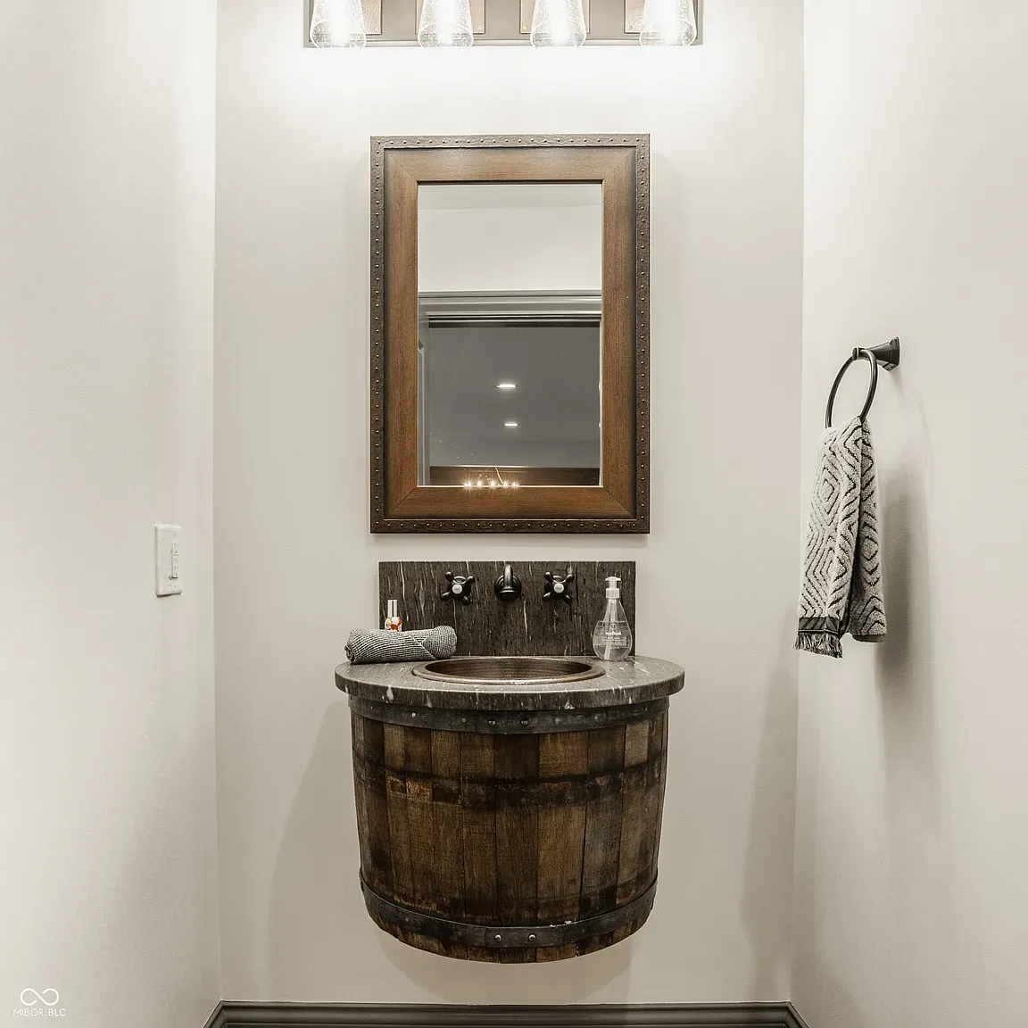 Barrel sink! Rustic meets polished and somehow it works.