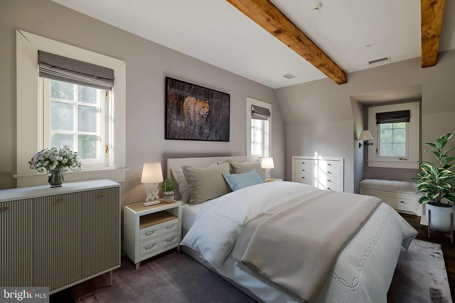 Soft gray bedroom, gentle light. Calm without being boring.