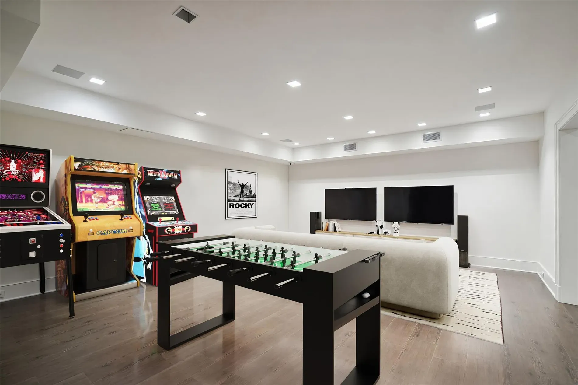 Game room starter pack—arcade on one side, clean lines everywhere else.