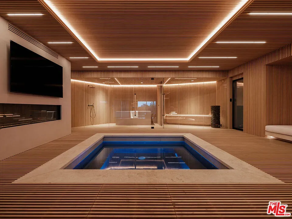 Then this wood cave—panels everywhere. Warm, zen. Maybe too much cedar?