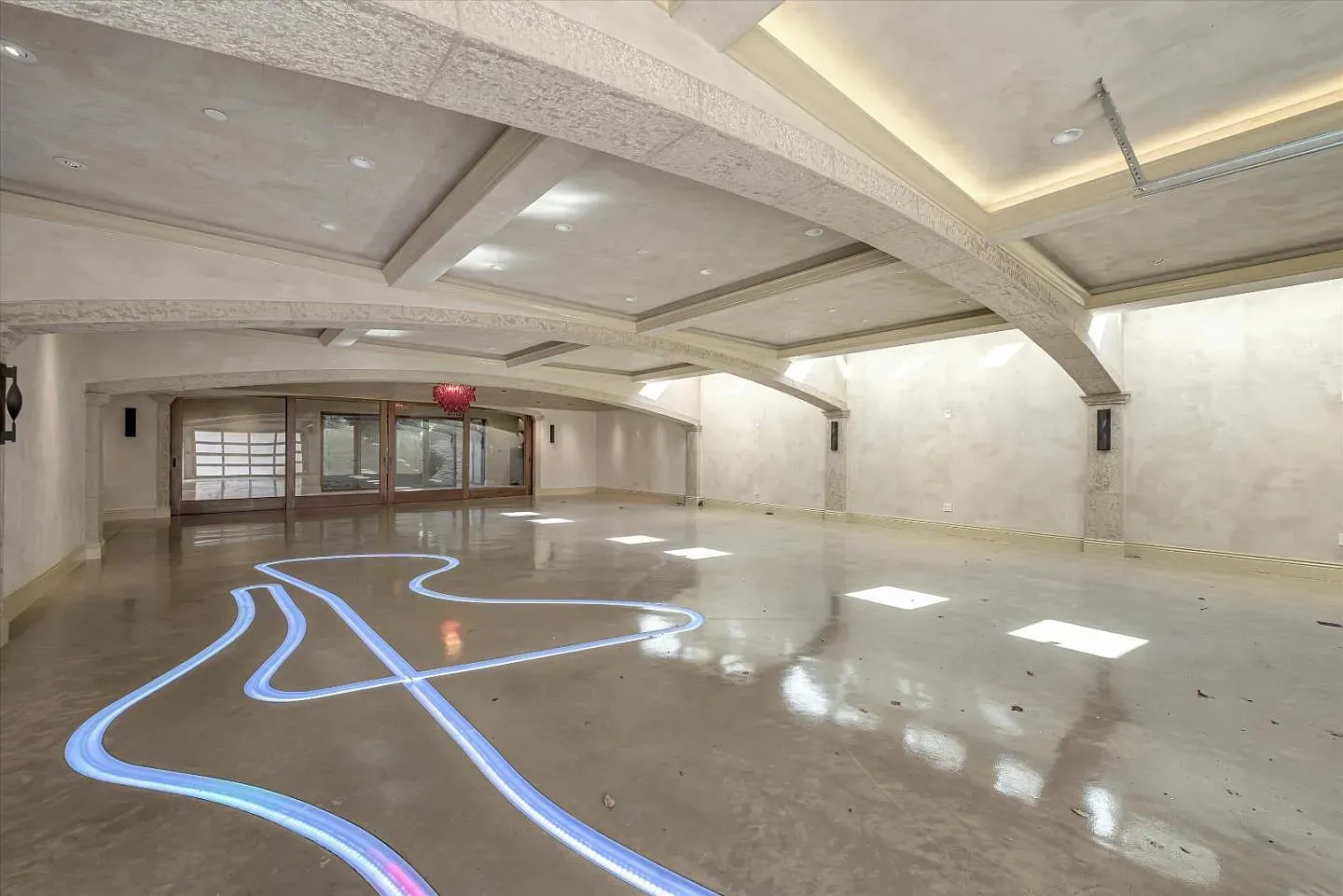 Those arched beams are wild, and the ceiling height is doing the most.