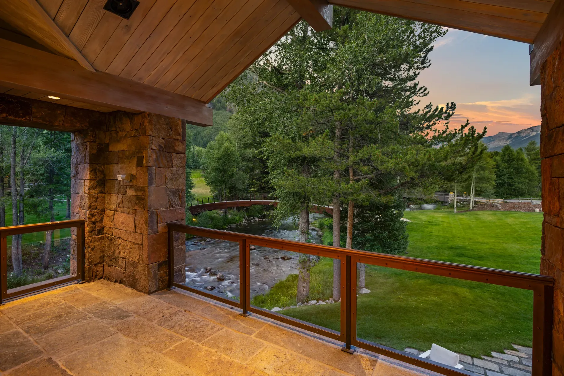 Back outside—the balcony—timber frame, big sky. Coffee spot secured.