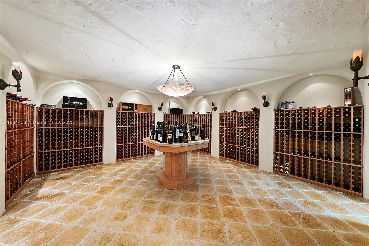 And then, wine cellar with glowing lights and stone floors. I'd live here.