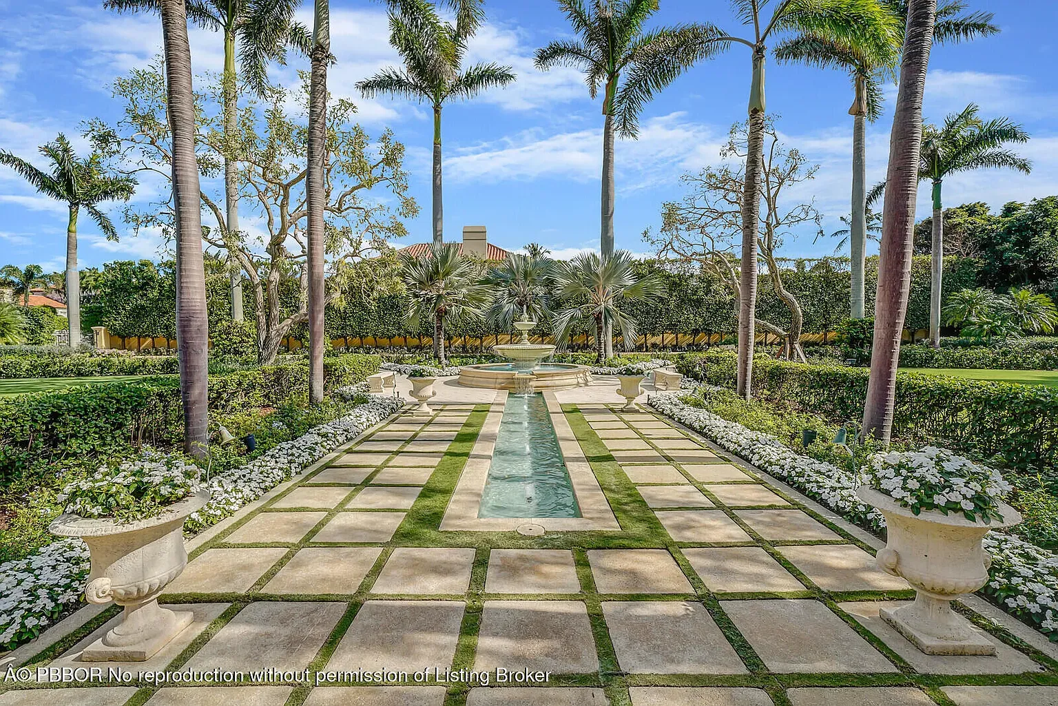 This garden path with square slabs and white blooms is weirdly satisfying.