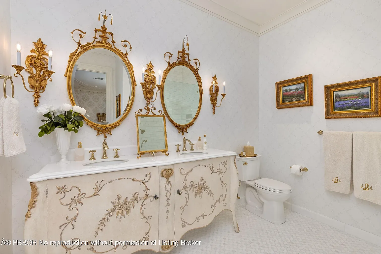 Three mirrors over one vanity. Anyone know why they did this?