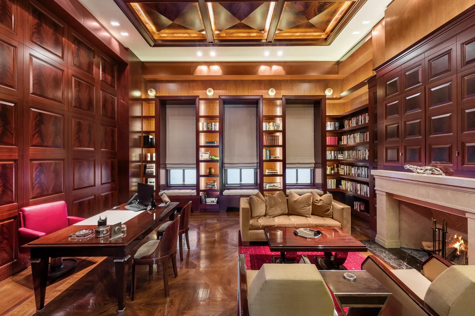 Mahogany library with coffered ceiling. Smells old books and power.