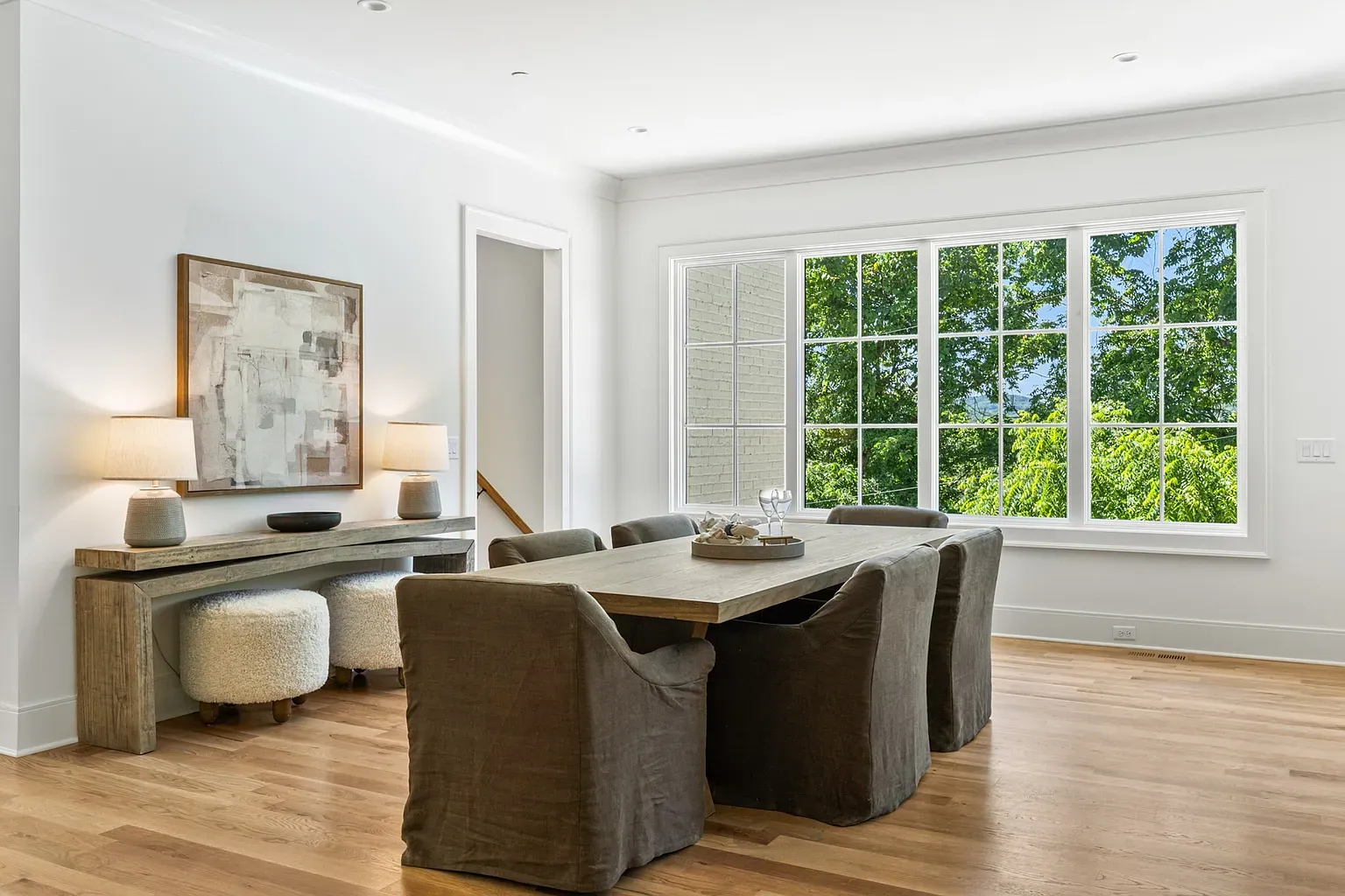 Reclaimed wood table stealing the spotlight. Cozy but still sleek.