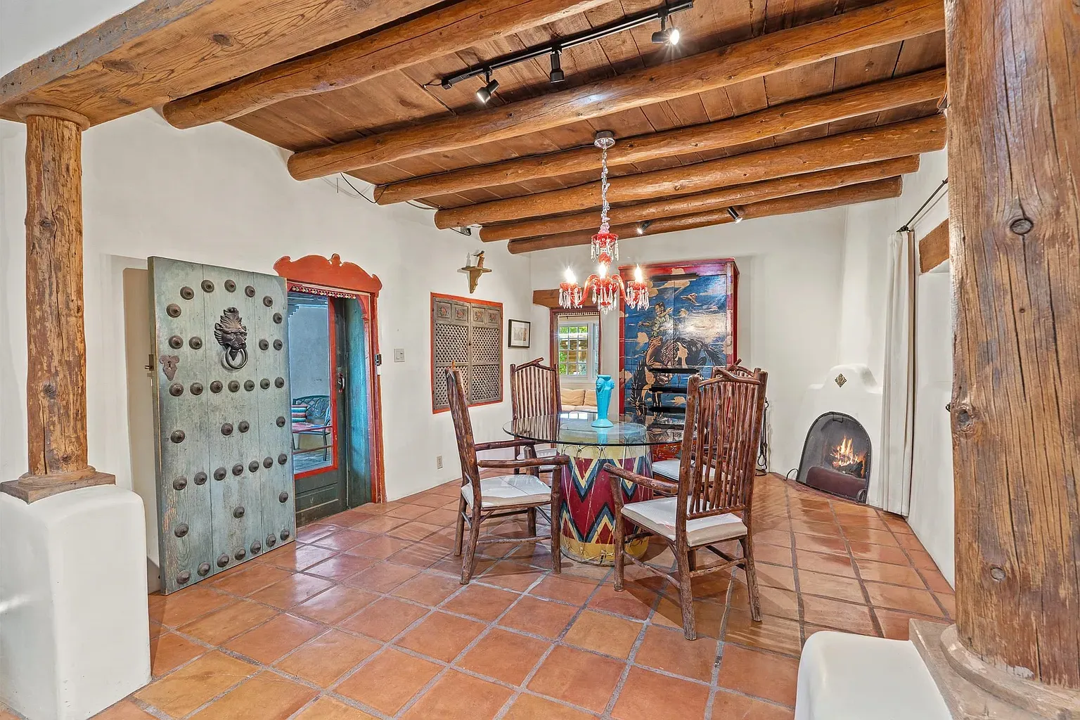 Exposed beams up top, terracotta underfoot. Straightforward Southwest comfort.