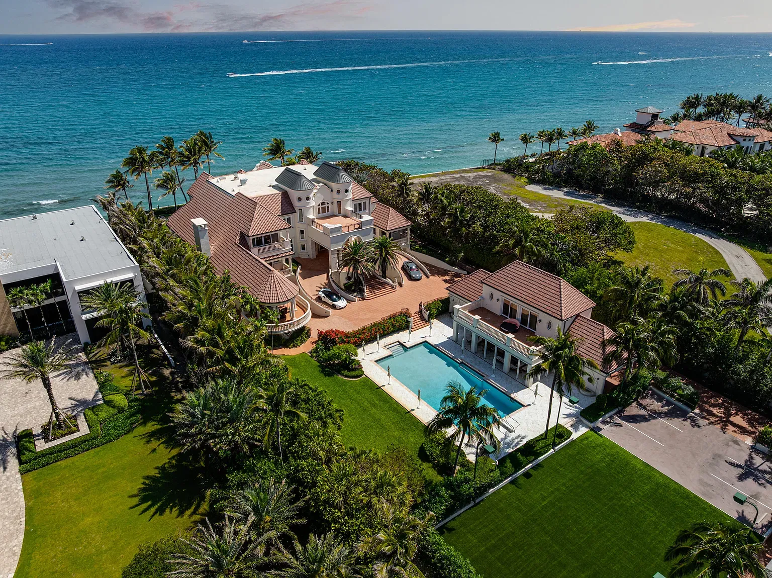 Here's the coastal front—terracotta roof, soft beige walls, very calm vibe.