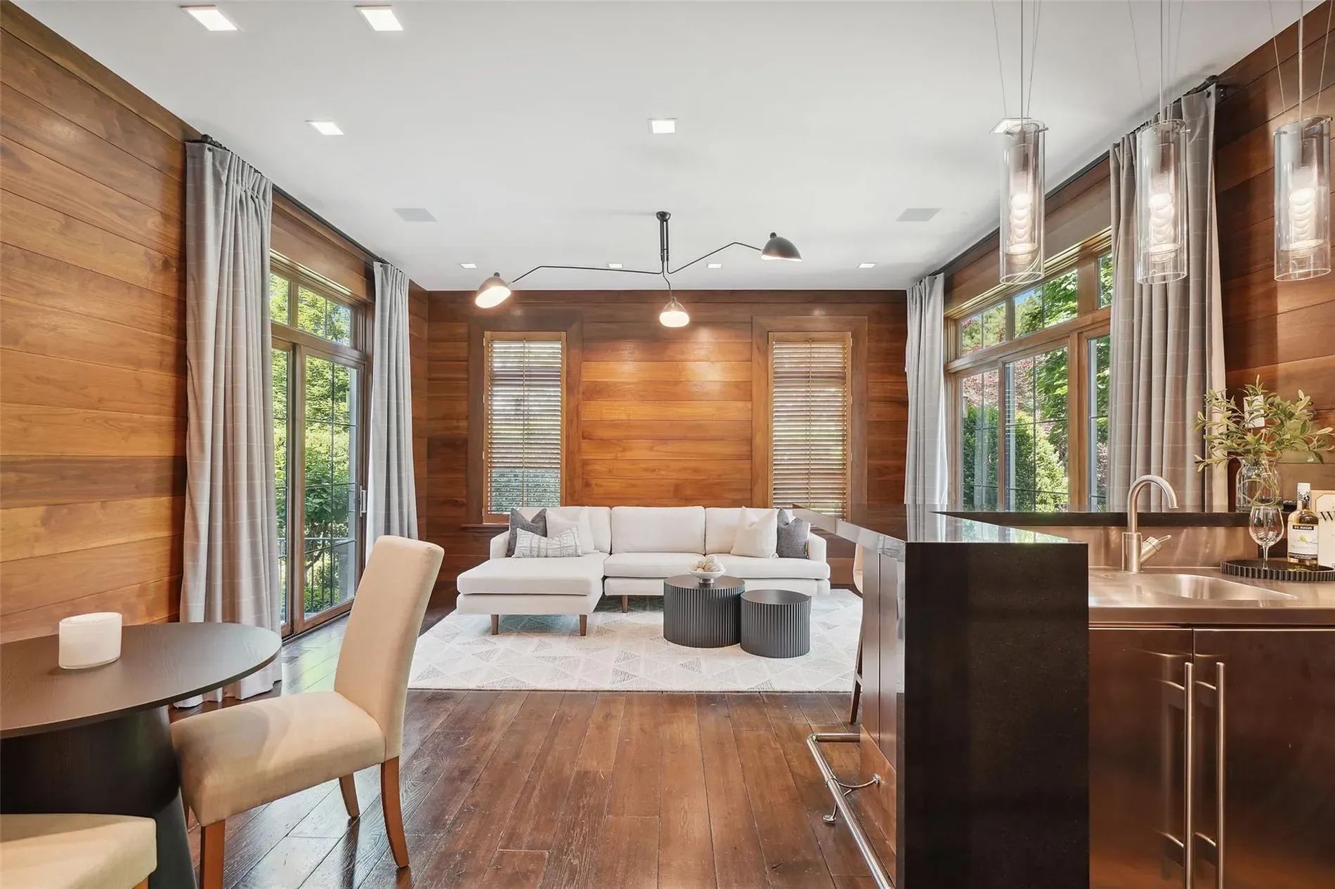 Moody wood walls, then sunlight blasting in. Not sure, cozy or cave?