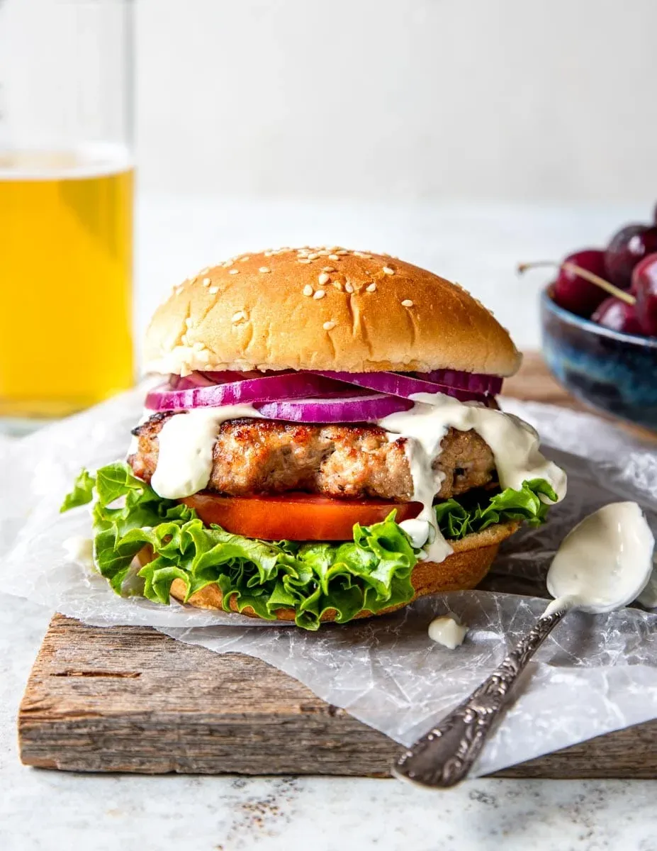 Grilled Pork Burgers with Garlic Cream Sauce