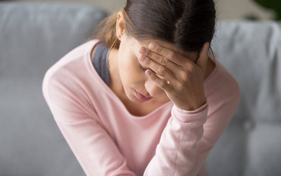 person experiencing a headache