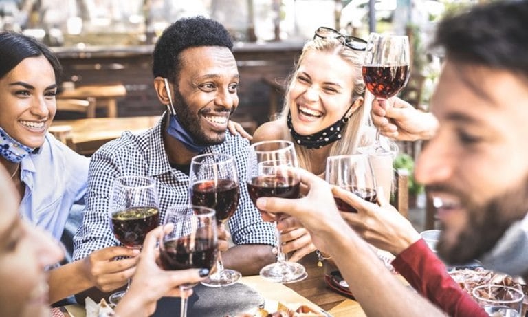 person tasting wine