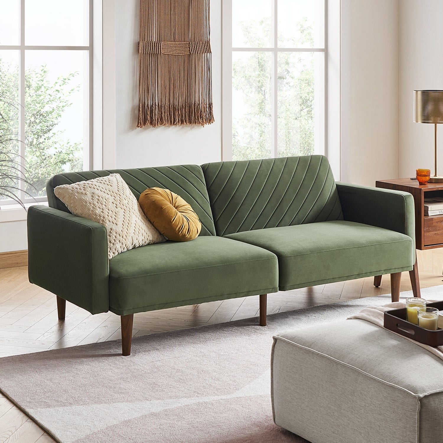 living room with olive green velvet futon sofa bed with adjustable backrest