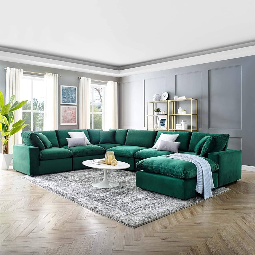 living room with jade green velvet sectional with deep seating and plush back cushions