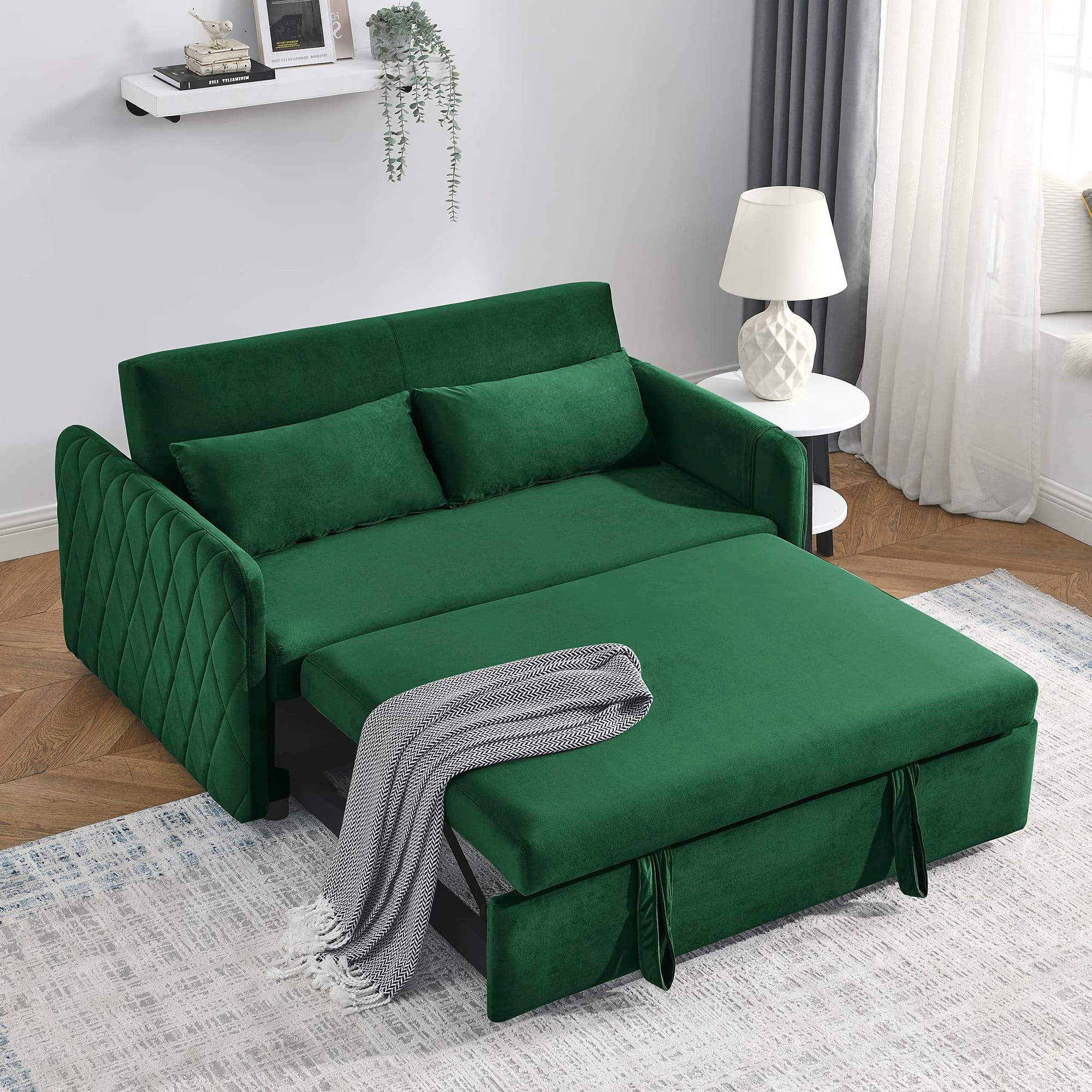 living room with pistachio green velvet convertible sofa bed with storage pockets