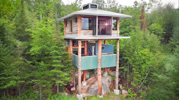 He Built a Two-Story Treehouse From Forgotten Barns