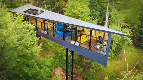 He Suspended a 100-Foot Cabin 60 Feet Above a Lake